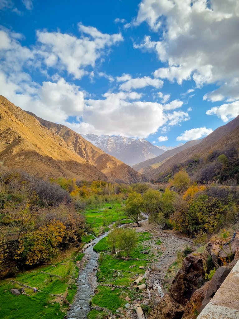 Beautiful mountain landscape in Imlil, Morocco with clear skies and vibrant greenery.
